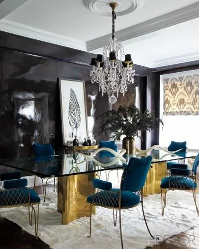 Glass Dinner Table Gold Metal Base And Blue Cusioned Chairs