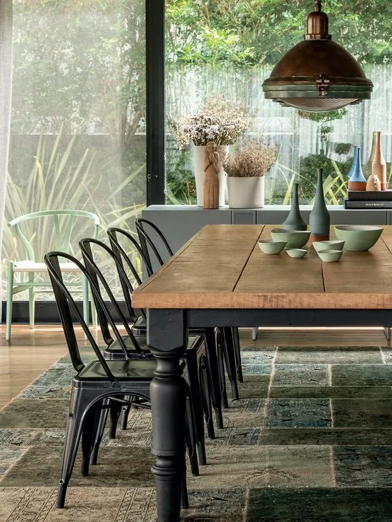Industrial Dining Room Set With Metal Chairs And Copper Chandelier