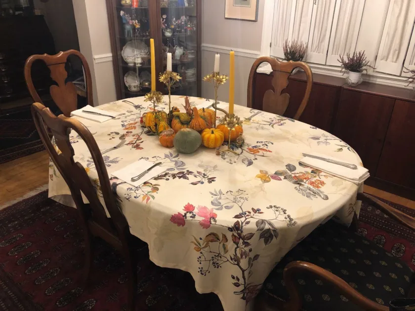 Orange Pumpkins Centerpiece White Tablecloth Wooden Chair Christmas Dinner Table Decorations