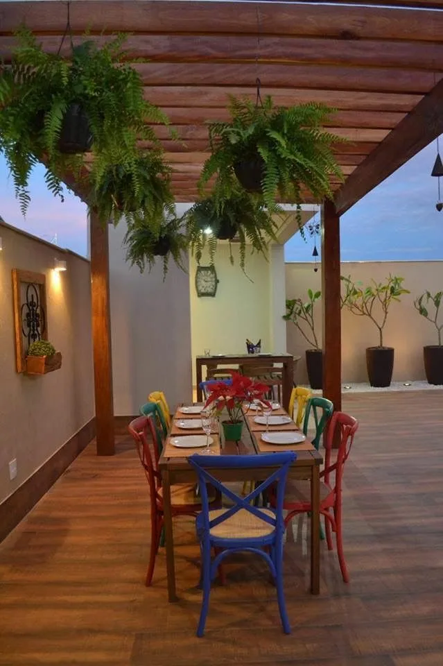 Rectangular Dinner Table Wood On Outdoor Shade With Colorful Chairs