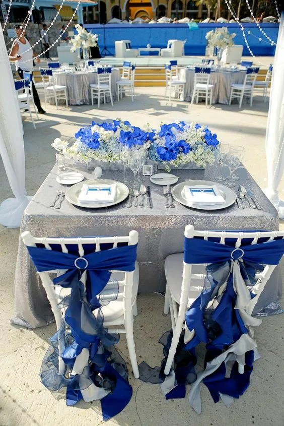 Square Dinner Table Glitterd Silver Tablecloth With Floral Centerpiece