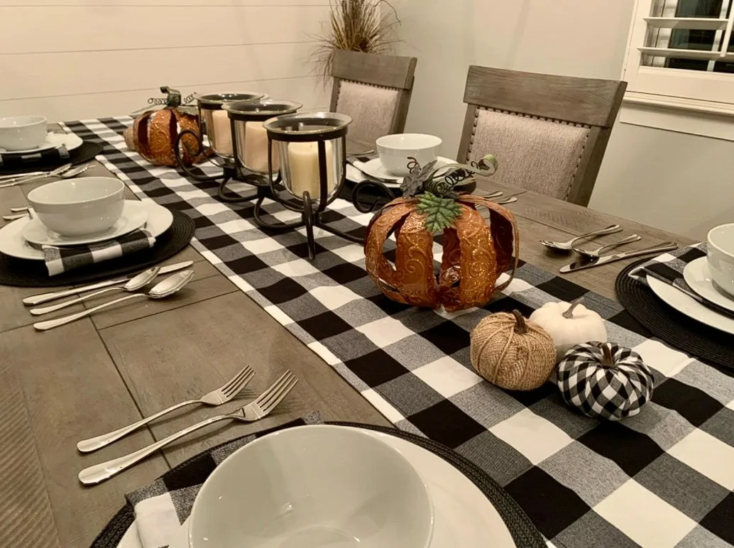 Table Setting Ideas For Thanksgiving Checkered Table Runner With Candles And Pumpkin Centerpiece