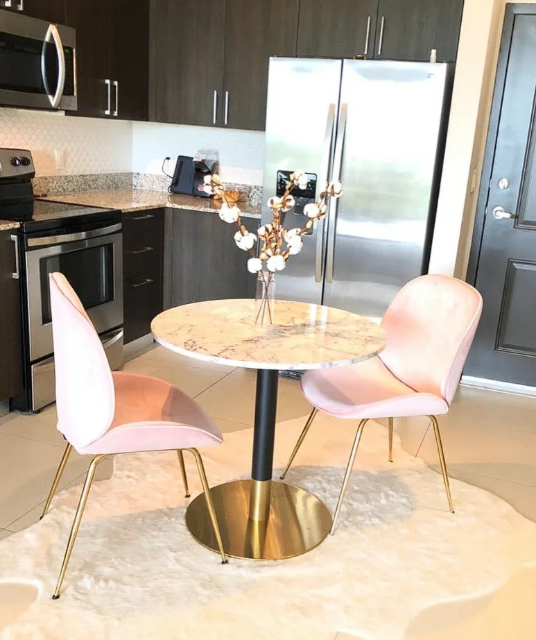 Kitchen Dining Table Marble Round Top With Gold Metal Base And Pink Chairs