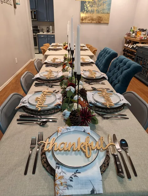 White Tablecloth Thankful Sign White Candlesticks Thanksgiving Table Decor