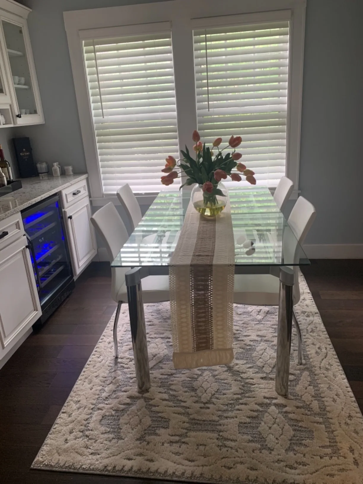 White Tablerunner Clear Glass Flower Vase Angle View Window Blinds Kitchen Dining Table