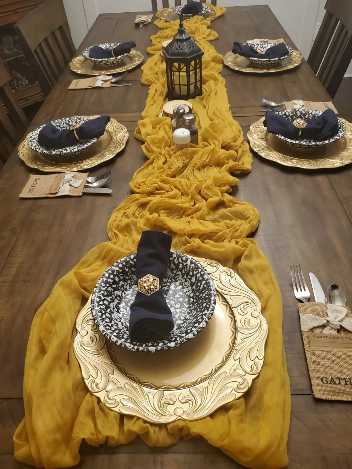 Yellow Tablerunenr Cheesecloth Gold Chargerplates Top Angle View Dinner Table Setting