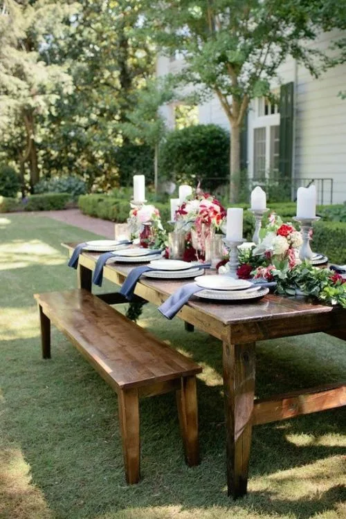 Outdoor Dinner Wood Table With Plant Table Runner And Candle Holder Centerpiece