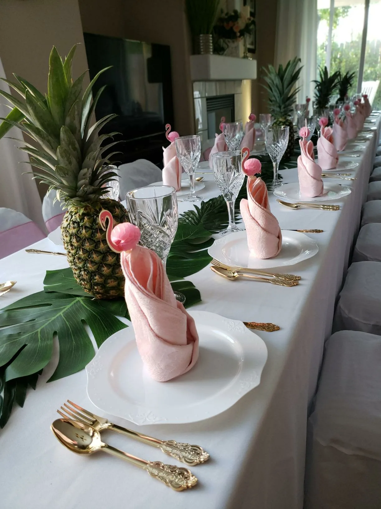 Green Placemats Centerpiece Pineapple Pink Napkins Flamingo Angle View Dinner Table Setting