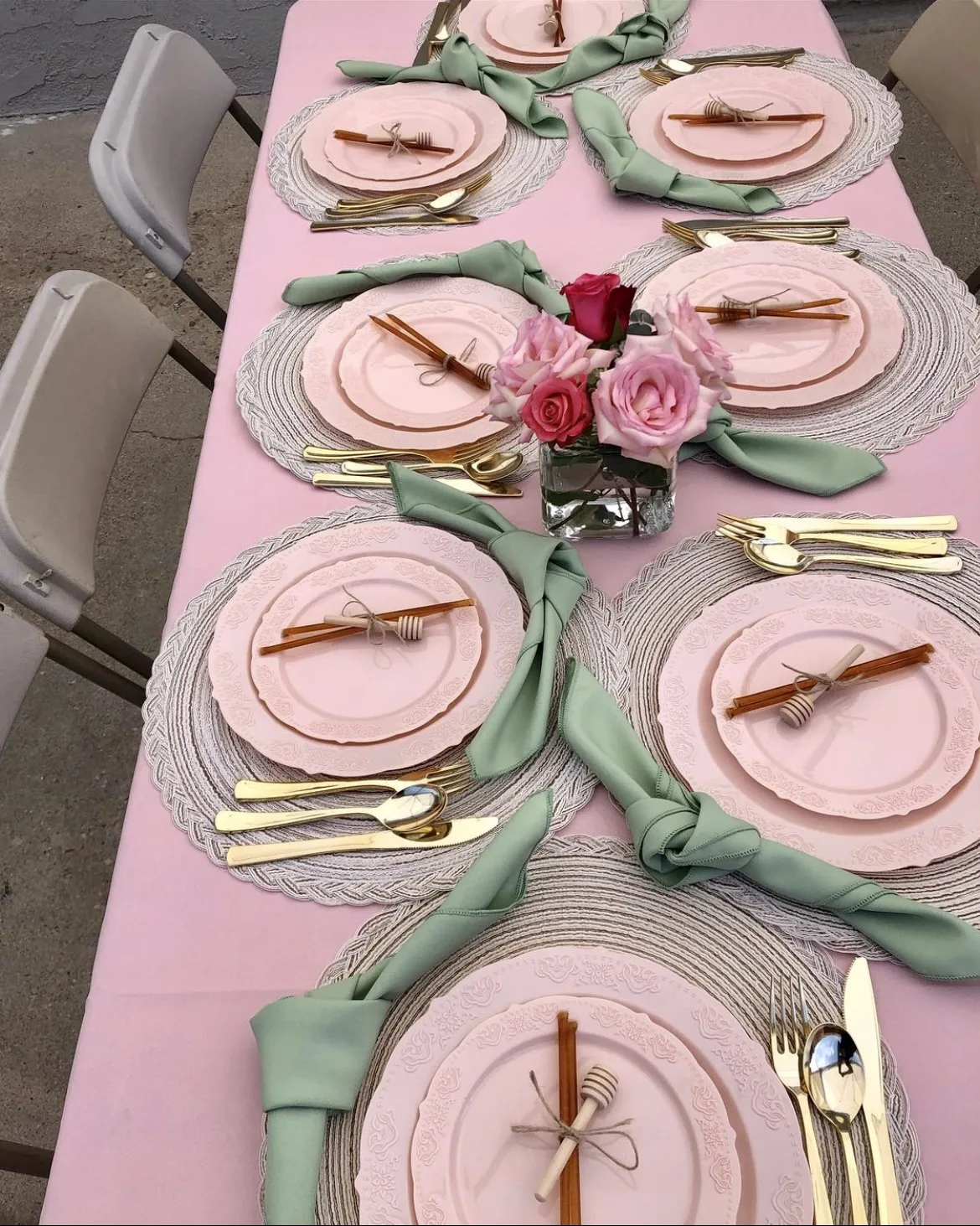 Pink Plates Plastic Flowers Top Angle View Dinner Table Setting