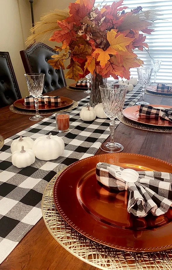 Tablescape Ideas For Fall Orange Charger Plates With Orange Leaves Centerpiece